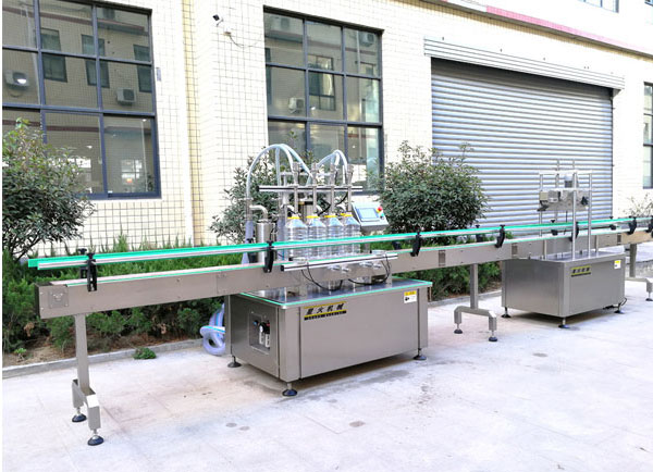 全自動(dòng)食用油灌裝機(jī)生產(chǎn)線設(shè)備